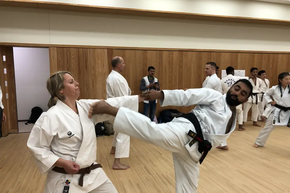 Sensei Najmal Ibrahim training kumite in a dojo in Japan