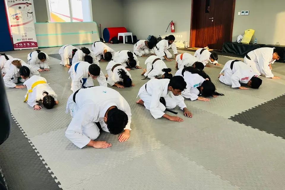 Students bowing at the end of class